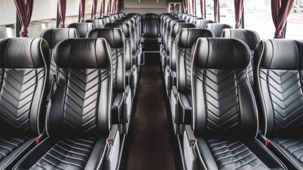 50 passenger charter bus inside boulder