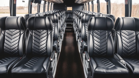 56 passenger charter bus inside aurora